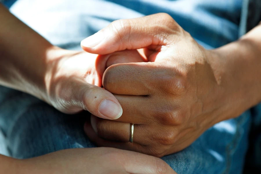 Community health worker with patient in rural setting